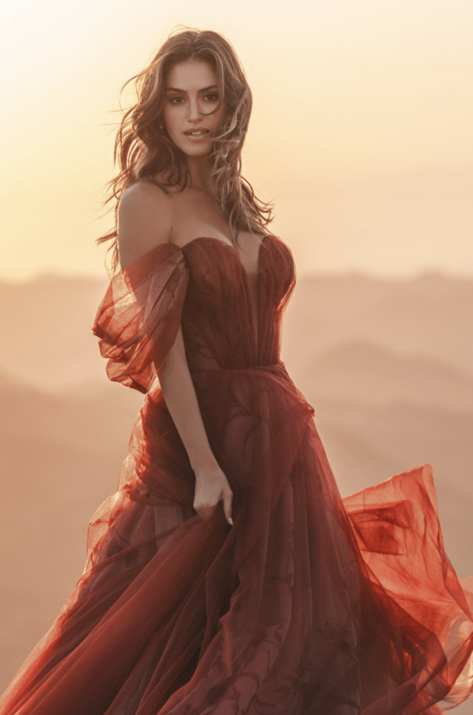 Non-white wedding dress by Allure Bridals featuring a wine red color