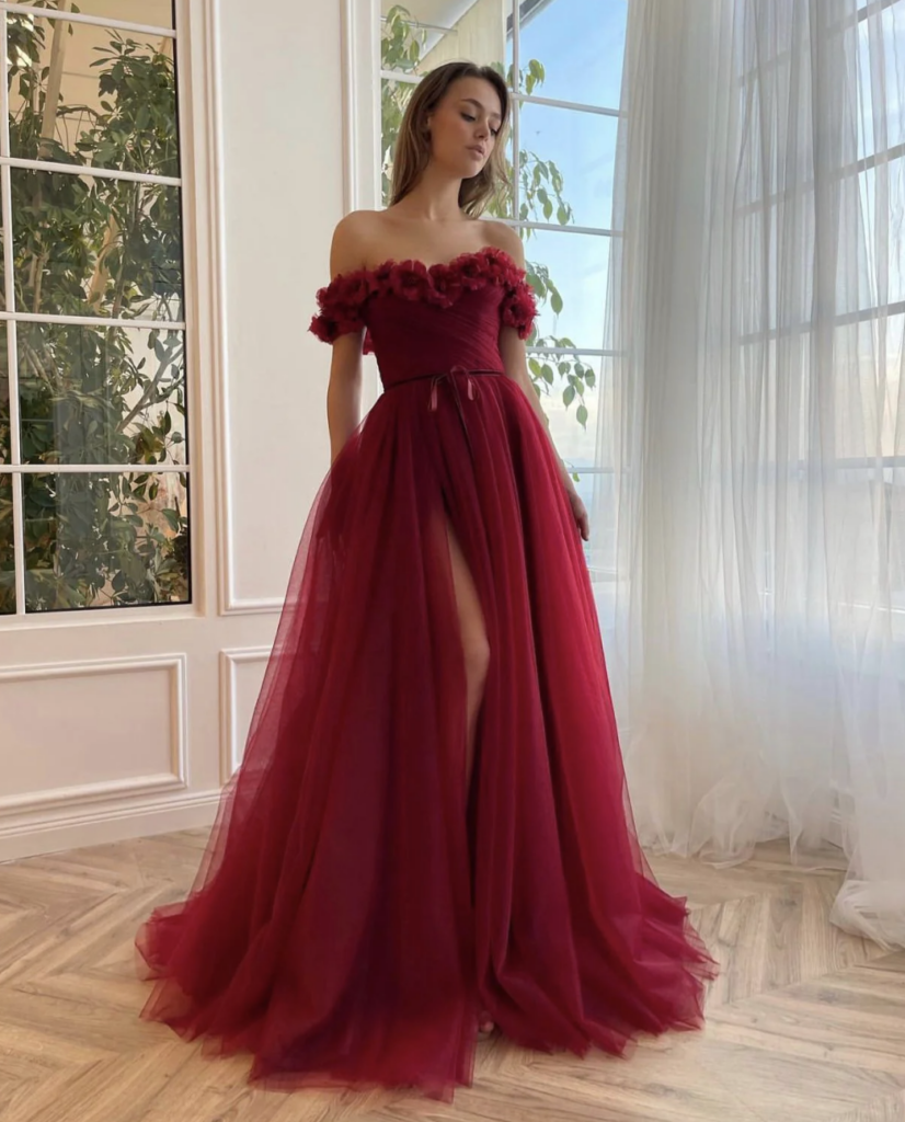 Non-white wedding dress featuring crimson gown by Teuta Matoshi