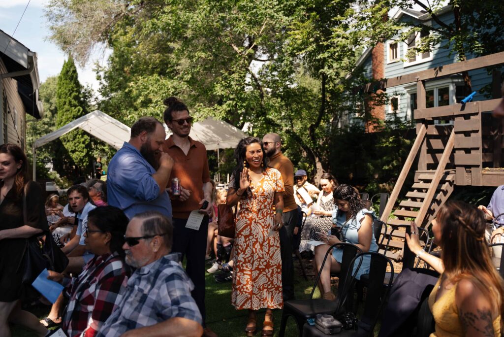 Guests arriving to this backyard wedding in Saint Paul, Minnesota