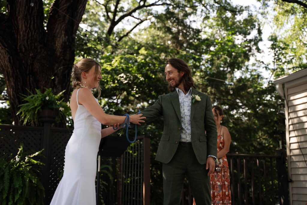 This backyard wedding in Saint Paul, Minnesota had a hand fasting ceremony