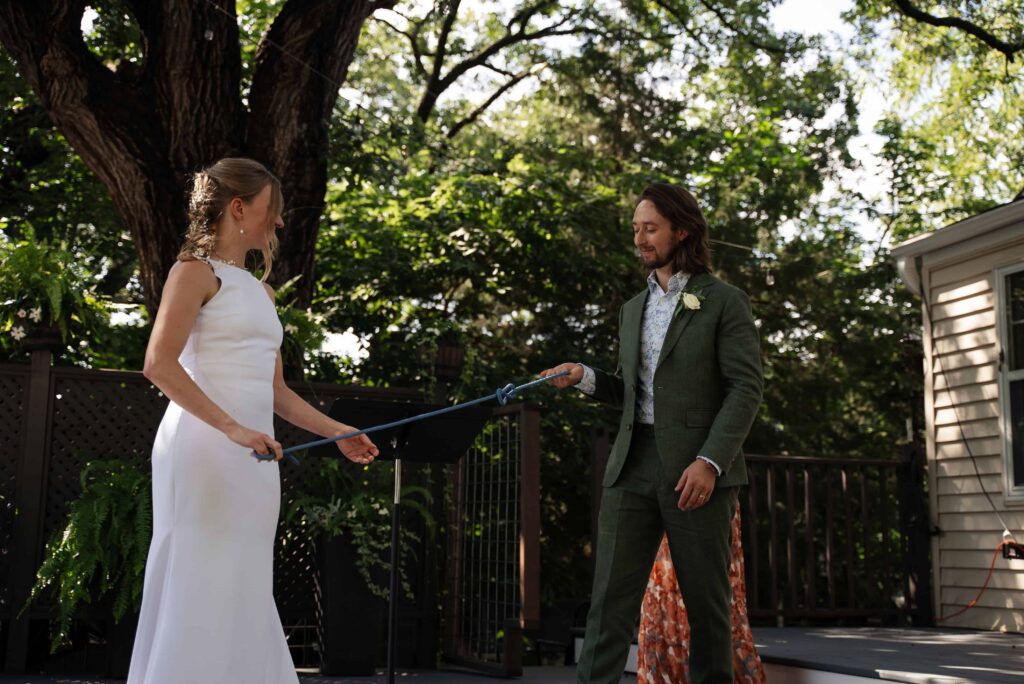 Backyard wedding in Saint Paul, Minnesota, featuring a hand fasting ceremony