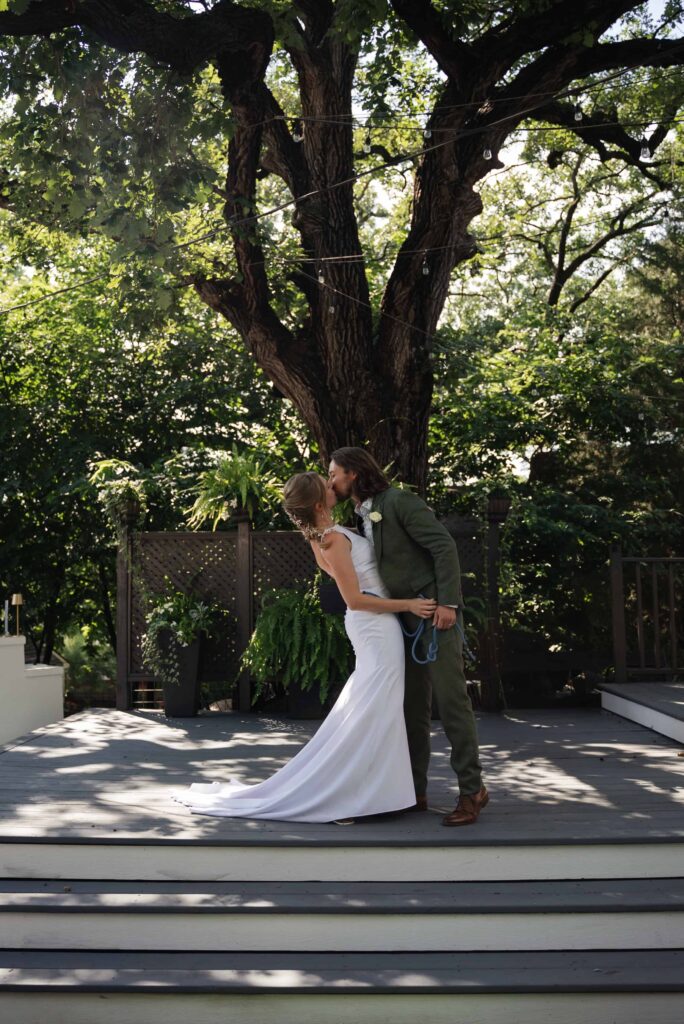 First kiss at this backyard wedding in Saint Paul, Minnesota