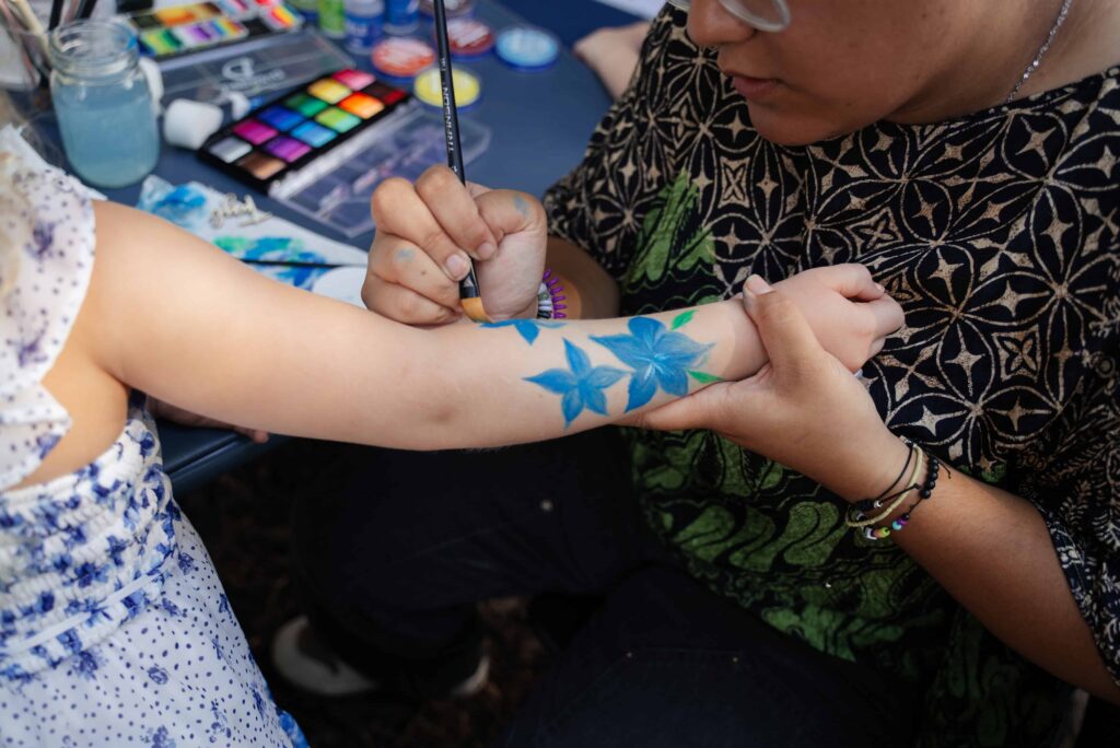 This backyard wedding in Saint Paul, Minnesota had local face painters
