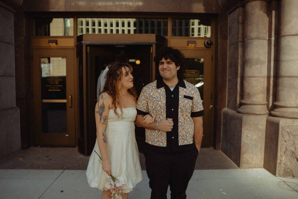 Couple in their elopement outfits at Minneapolis City Hall