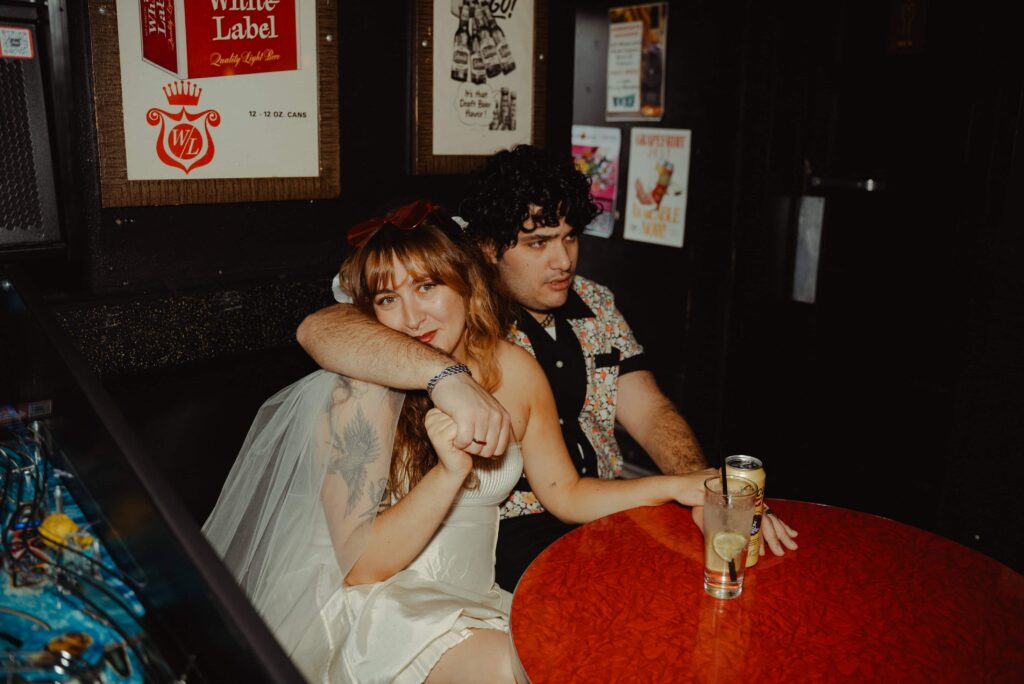 Minnesota elopement couple having drinks at a Minneapolis dive bar