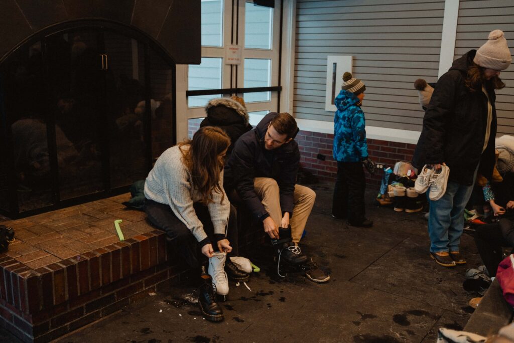 Ice skating engagement photos in at Centennial Lakes in Edina, Minnesota