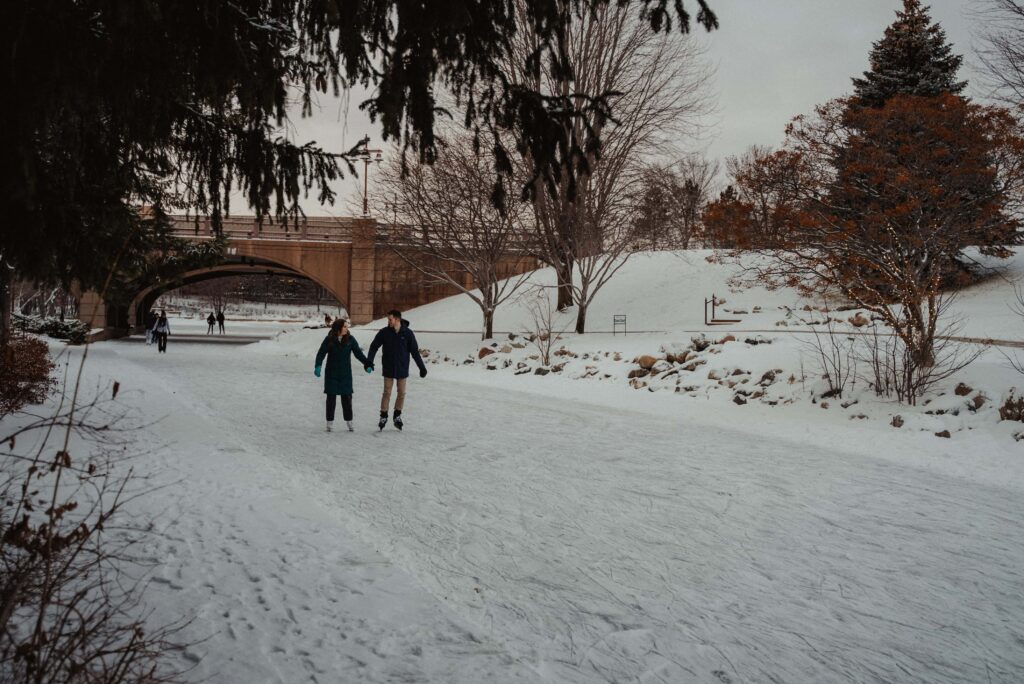 Ice skating engagement photo session at Centennial Lakes in Minneapolis, Minnesota