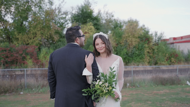 Bride and groom with florals provided by The Bridekick