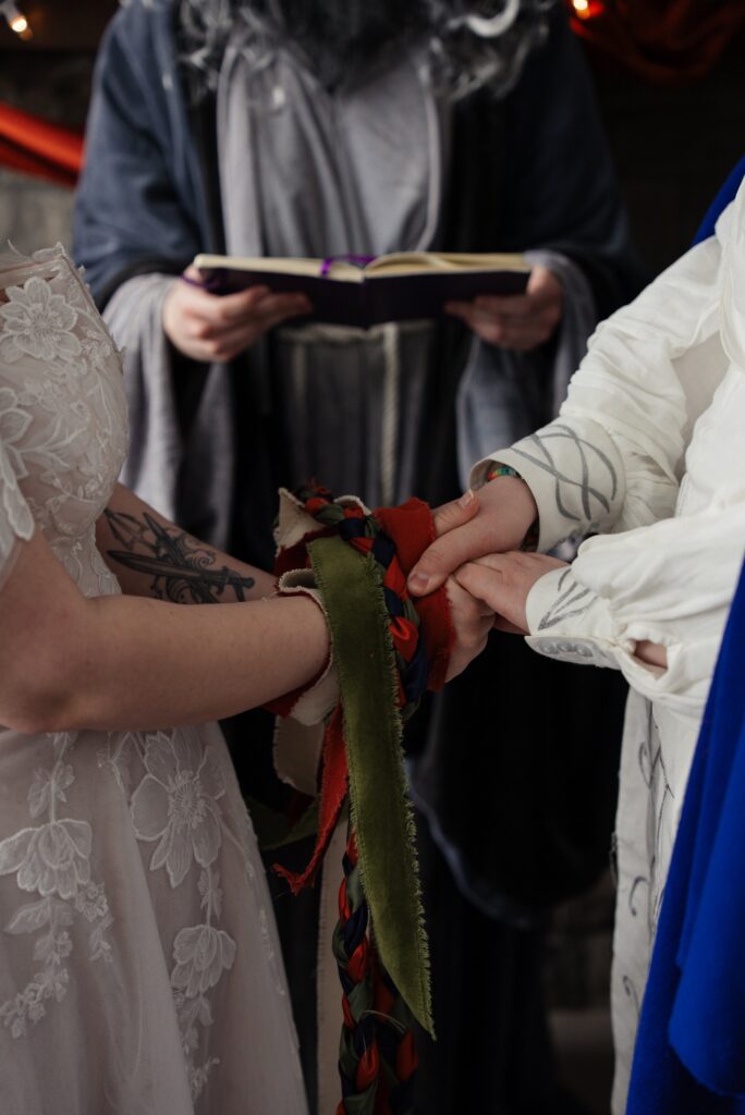 Hand fasting ceremony in this queer micro-wedding in Minnesota